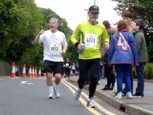 Danny Sheerin waves to supporters during this year's Walled City Marathon.