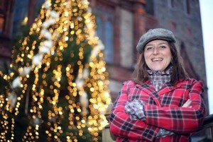 Tina McLaughlin beside the "Lace" Christmas tree in Guildhall Square. Photo: Lorcan Doherty Photography