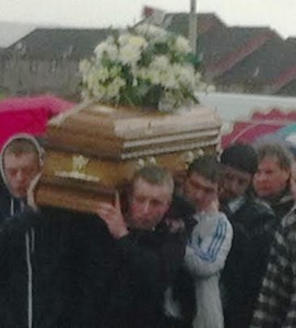 Andrew's coffin being carried to St Joseph's Church.