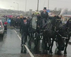 The funeral cortege making its way to St Joseph's Church.
