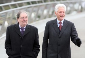 Former US President walks Derry's Peace Bridge with John Hume. Photo: Lorcan Doherty Photography.