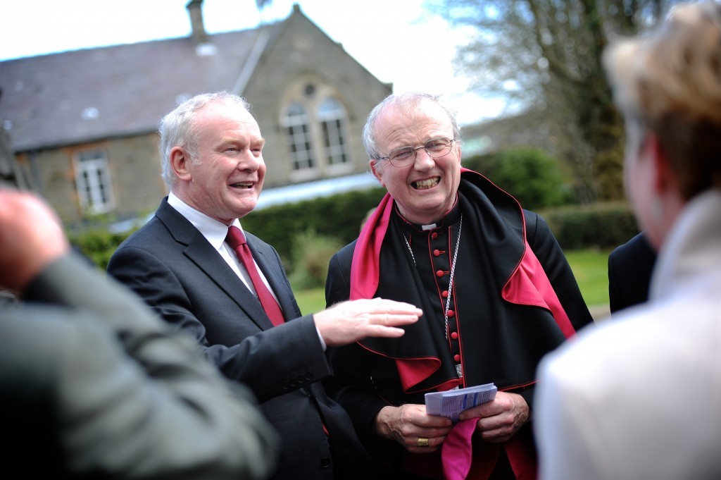 Bishop McKeown shares a joke with Deputy First Minister Martin McGuinness.