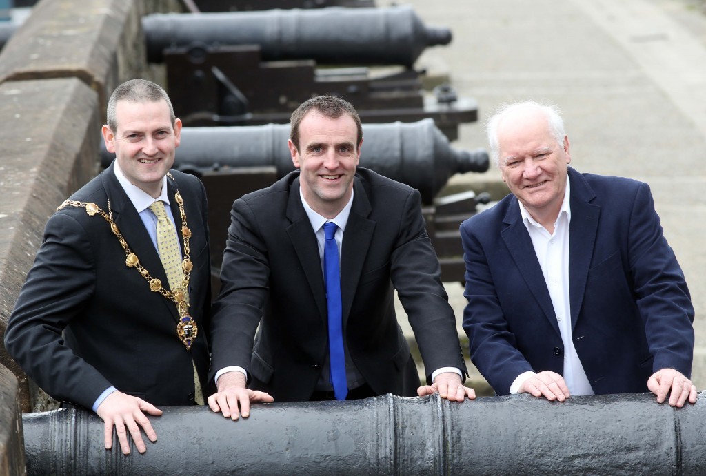 Evironment Minister Mark H Durkan (centre) announcing the £35,000 funding for Derry's Walls. Included are the Mayor of Derry Cllr Martin Reilly and Eamonn Deane, director, Hoywell Trust.