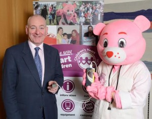 Foyle MP Mark Durkan getting his pulse tested to support babies being tested for heart conditions at birth.