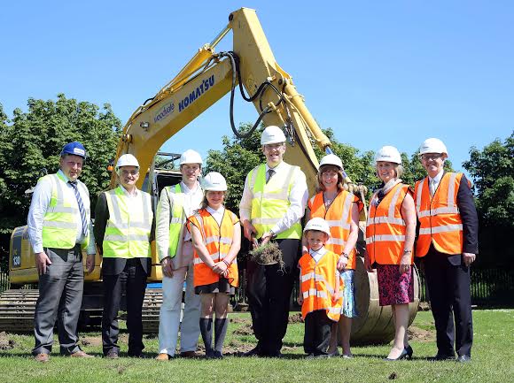 Education Minister John O'Dowd cutting the sod to start the construction of the new Eglinton Primary School. Included, from left, are Robert Ewing, Woodvale Construction, Donal Coyle, senior architect, Peadar Murphy, senior principal architect, WELB, pupils Laura McClelland and Rhys Thompson, Mrs. Lorna Blair, principal, Donna Vaughan, chair, Board of Governors, and Robert Herron, chairman, WELB. Photo: Lorcan Doherty Photography