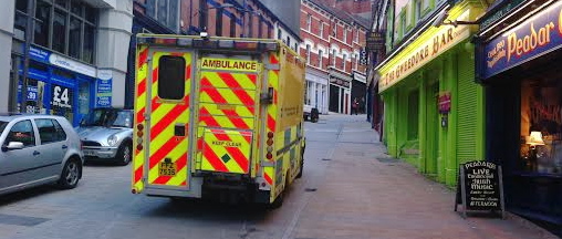 The ambulance taking the fatally injured man to hospital.