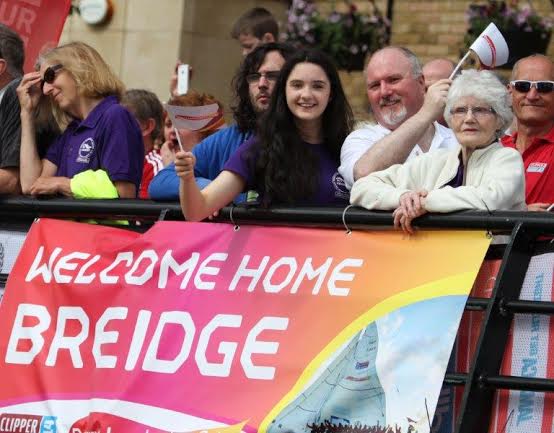 Breidge Boyle's family with their banner welcoming her home.