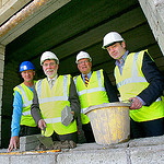 Housing Minister Nelson McCausland on the site of the new £1.7 million social housing scheme at Nelson Drive with, from left, Damien Catterson (foreman), Robert Moore, Trinity Housing Association and Conor McGirr, McGirr Architects.