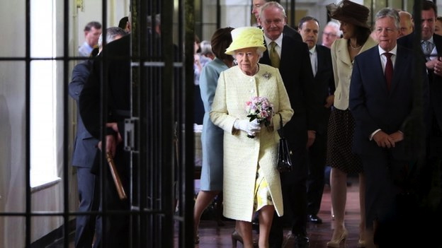 Queen Elizabeth being accompanied by Martin McGuinness during her visit to Crumlin Road jail yesterday.
