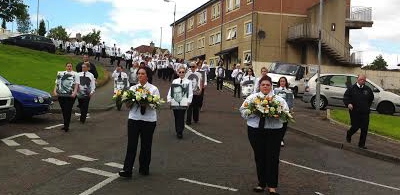The "Volunteers Commemoration" parade making its way into Derry City Cemetery.