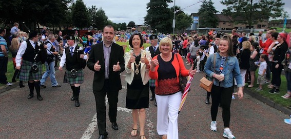 Cllr Angela Dobbins (in red) taking part in the Earhart Festival parade with Mayor of Derry Cllr Brenda Stevenson and Cllr Brian Tierney.