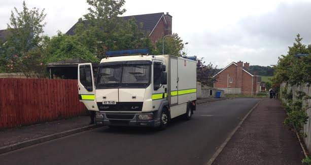 The bomb disposal team at the ongoing alert. Photo: Stephen Latimer.