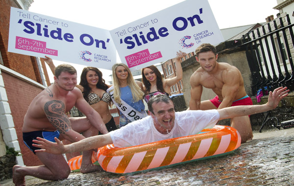 Environment Minister Mark H Durkan making a splash at the launch of the Derry "Slide On." (Photo - Tom Heaney, nwpresspics)