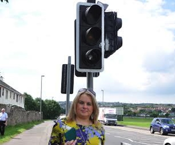 Cllr Duffy at the damaged traffic lights.