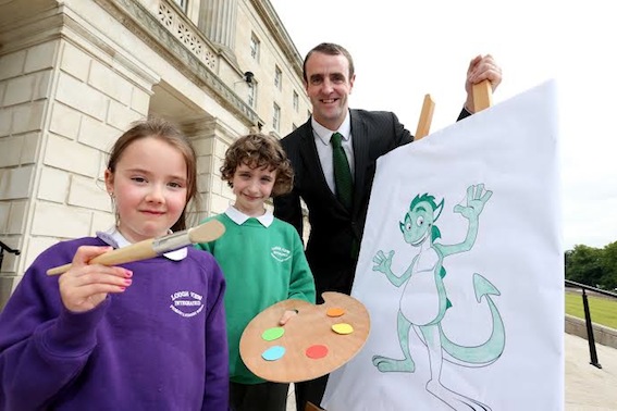 Tiarnan Lyons and Rebecca Walker, P3 pupils at Loughview Integrated Primary School, helping Environment Minister Mark H. Durkan launch the Belfast Harbour Green Teacher of the Year Award.