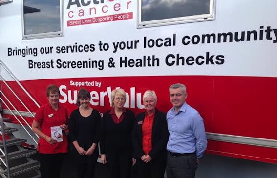 Declan Corry, shop assistants Catherine Power and Alison Williamson, with Radiographer Julie McGrath, and Health Promotion Assistant Amy Wright, during the visit of Action Cancer's Big Bus to Supervalu in Shantallow yesterday.