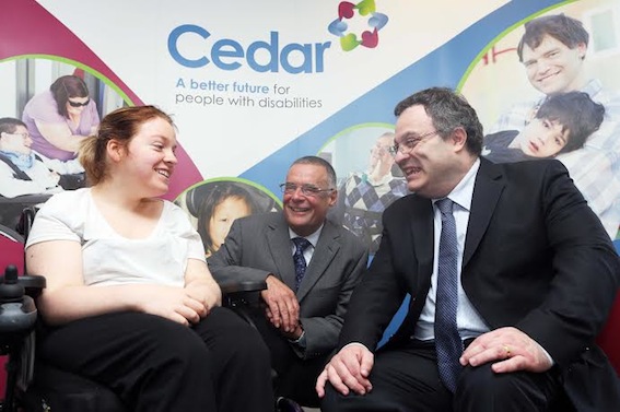 Employment and Learning Minister Dr Stephen Farry talking to service user Jade Kelly and Stephen Mathews, chief executive, Cedar Foundation, during a visit to the Cedar Foundation in Derry for a celebration event and open day to recognise their success in the North West. Photo: Lorcan Doherty Photography