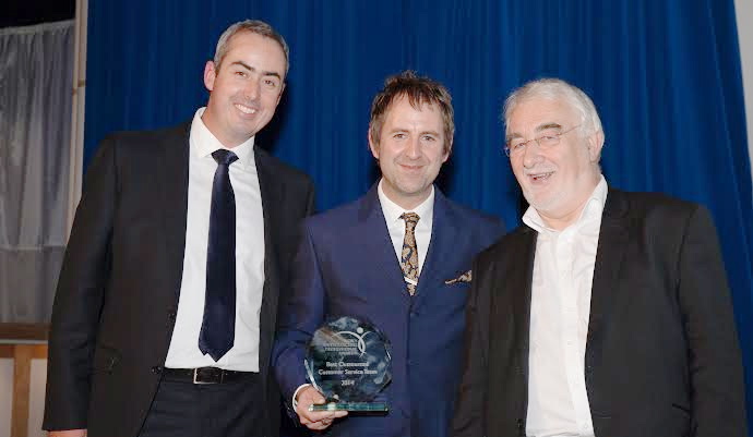 For Best Outsourced Customer Service Team: From left, Lou Zonato, Senior Vice President - Client Relationship Management for Telecom & Media, Firstsource; Ash Schofield, Marketing & Experience Chief at giffgaff and Adrian Quayle NOA founding fellow and Managing Partner at Avasant (award presenter).
