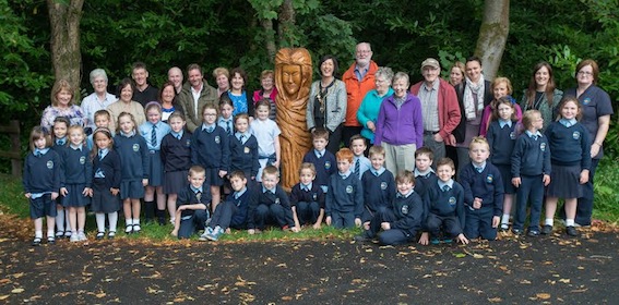 Members of the local community and children from St. Mary's Primary School Altinure, with of the new sculptures created in Learmount Forest as part of a new Sculpture Trial. Included are Annie Mullen, Derry City Council, the Mayor, Councillor Brenda Stevenson, Jim McColgan, chairperson of ARK North West and Caroline Lynch Learmount Community Centre Manager. Photos: Martin McKeown. Inpresspics.com.
