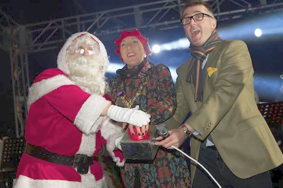 Santa switches on Derry's Christmas lights with the help of Mayor Cllr Brenda Stevenson and MC, Mark Patterson, BBC Radio Foyle.