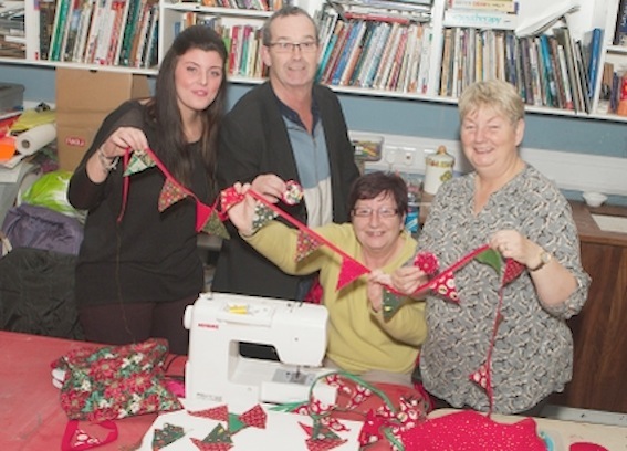 From left, Rachel Mullan-Carlin, IFI Peace Walls Project, Eddie Breslin, Housing Executive cohesion advisor and Joan and Donna Best at a "Bunting Making" workshop for women from the Fountain and Bishop Street areas. (Photo - Tom Heaney, nwpresspics)