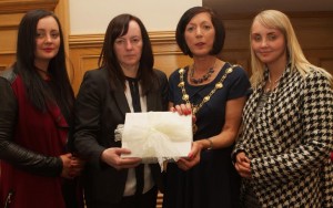 Mayor Brenda Stevenson handing over Books of Condolence to Sharon McCrossan. On left, is Christina McCrossan, and on right, Charlene McCrossan, daughters. (Photo - Tom Heaney, nwpresspics).