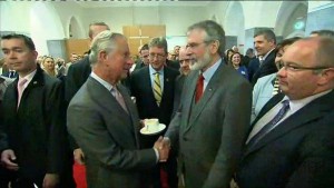 Prince Charles shakes hands with Sinn Fein president Gerry Adams in Galway