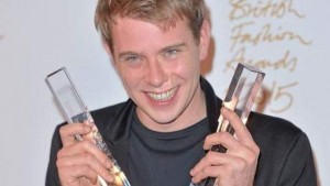 A happy JW Anderson cluthcing his two gongs at last night's British Fashion Awards