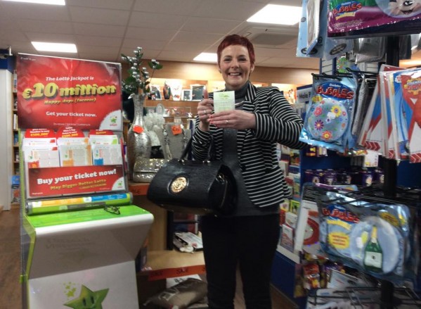 IT COULD BE YOU...Shop assistant Brid Coogan delighted someone won Euro Millions Plus draw last night