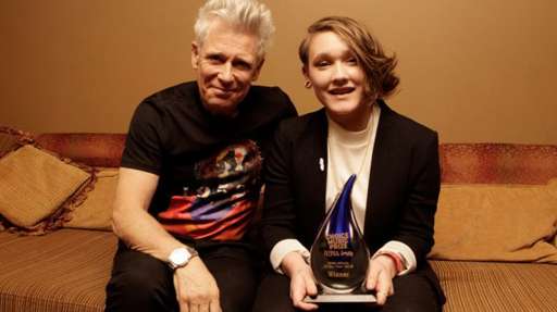 SOAK receiving her award in Dublin from U2's Adam Clayton in March