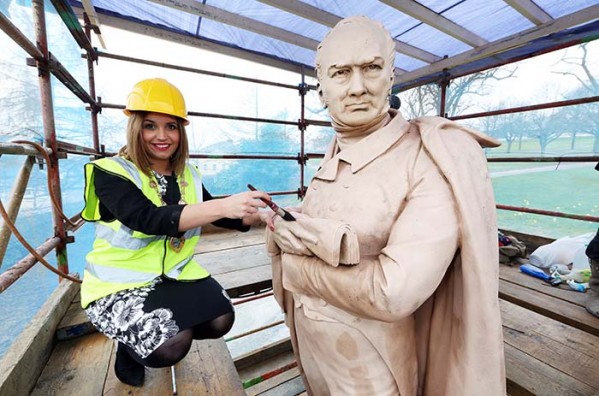 Mayor Elisha McCallion with the Brook Park 'Black Man' statue: Photo By Lorcan Doherty Photography