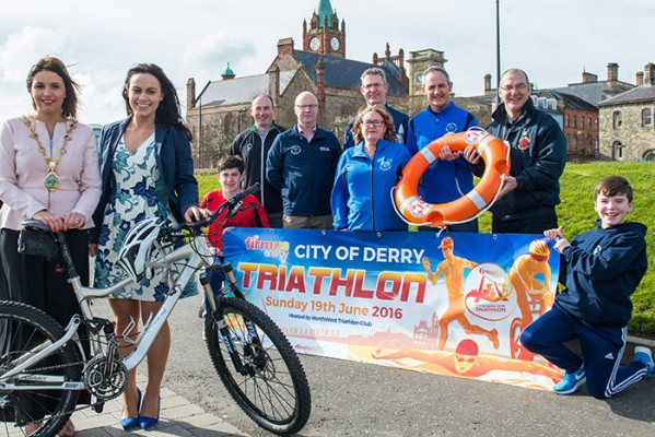 Mayor of Derry City and Strabane District Council, Cllr Elisha McCallion, helps Angeline Murphy of firmus energy launch the 2016 firmus energy City of Derry Triathlon which this year will take place on Sunday 19 June. Also pictured are Eoin Taylor, Paddy McLaughlin, Triathlon Ireland, Adrian Kelly, race director, Noel Taylor, NWTC, Moira Glenn, NWTC, Paul McGilloway, NWTC, Pat Carlin, Foyle Search and Rescue and Ruairi Taylor