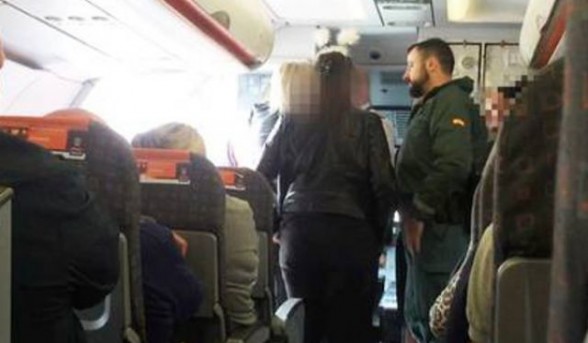 This is the moment when Spanish police board an Easyjet plane and escort off two Derry women for being 'abusive and disruptive