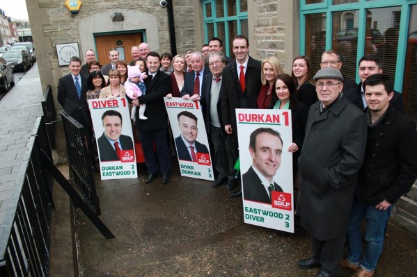Former SDLP leader John Hume joined the party's three candidates when they handed in their nomination papers