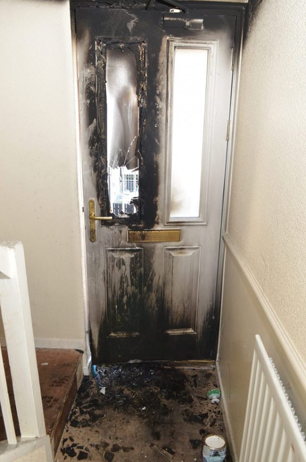 The scorched interior door of the property at Kennaught Terrace in Limavady following an arson attack at the weekend