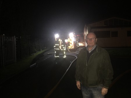 Sinn Fein councillor Kevin Campbell at the scene of last night's arson attack on Holy Child Primary School in the Creggan