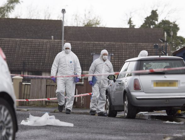 PSNI forensic officers examine the scene of the fatal stabbing in Derry where q young man lost his life. (North West Newspix)
