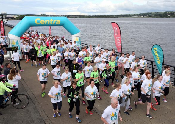 Over 250 families, friends and colleagues paired up for the 5k event which made its way across the Peace Bridge and into St ColumbÕs Park, raising vital funds for local charity Action Cancer. 