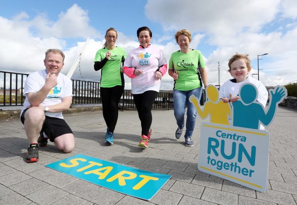 Press Release Image RUN TOGETHER FOR CHARITY: David Kelly, store owner of Centra Derry, Trench Road, is encouraging people to sign up for Centra Run Together with the help of runners Bronagh McLaughlin and Joanne Magee from Reach Running Club, Geraldine Kelly of Centra Trench Road and Cillian Black aged 3 years. PICTURE: PRESS EYE