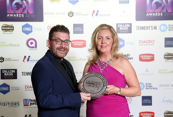 Una Kincaid of Pier 59 in Derry accepts her award as Newcomer of the Year from Linus Murray of category sponsor, O’Reilly Stewart Solicitors.