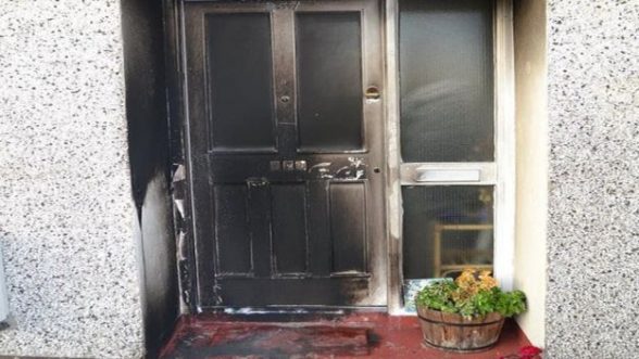 The scorched front door of Katie Greer's home in the Waterside's Nelson Drive after an arson attack