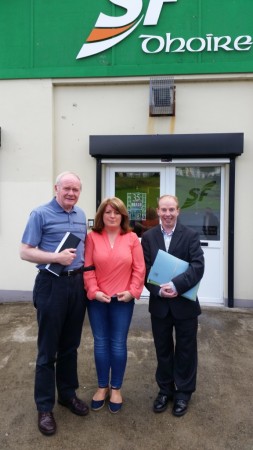 Sinn Fein Foyle MLA Martin McGuinness with Tony Taylor's wife Lorraine and solicitor Aiden Carlin