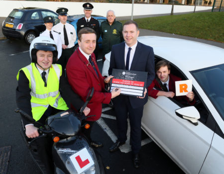 SHARE THE ROAD TO ZERO....Roads Minister Chris Hazzard launching Road Safety Week with young drivers and partner agencies of NIFRS, PSNI and Ambulance Service