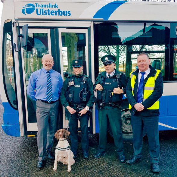 Rosie the police drugs sniffer dog with neighbourhood PSNI officers and Translink staff in Derry trying to keep school safe and out of the clutches of drug dealers