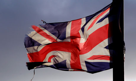 A union flag flies from a lamppost in the Shankill Road area of west Belfast