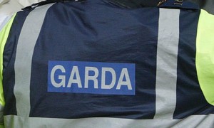 A Garda badge on an officers jacket
