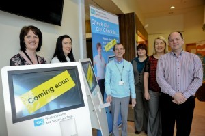 From left, tMandy Sharkey, Outpatients team lead, Louise Gallagher, system administrator, Neil Donaghy, clerical officer, Sorcha Duggan, patient access manager, Karen Phelan, service manager and Phillip McGowan, service manager over patients access,at the launch of the outpatients self check-in kiosks at Altnagelvin Hospital.