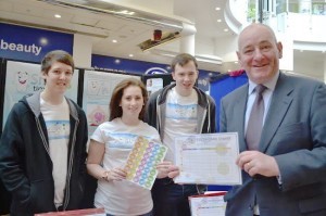 Foyle MP Mark Durkan MP was impressed with the products from "Smile Time" at the Young Enterprise NI Trade Fair.