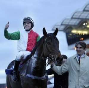 Barry Cash celebrates last year's Cheltenahm win on "Big Shu."