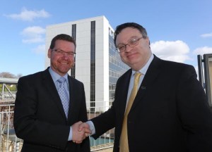 Employment and Learning Minister Dr Stephen Farry (right) congratulates Gerard Finnegan on his appointment as chair of the Governing Body of North West Regional College. Photo: Lorcan Doherty Photography.